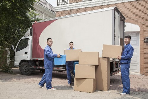 Removal team planning a move in a Whitechapel street