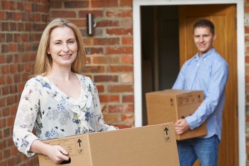 Packed boxes and furniture ready for van transport in East London