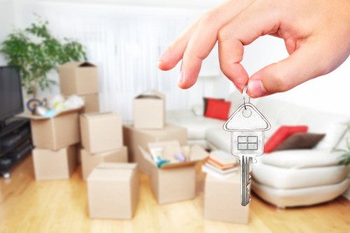 Whitechapel moving van service preparing boxes and furniture for transport
