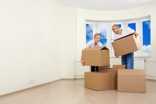 Careful packing and loading of household items for a Whitechapel move