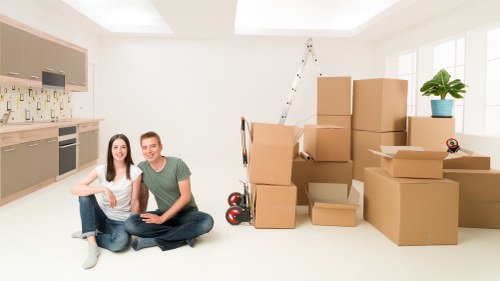 Careful loading of furniture and boxes for a local move in Whitechapel