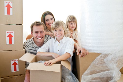 Boxes and furniture being packed for a home move in Whitechapel