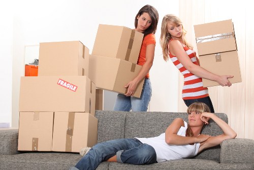 Professional movers organising household items in Whitechapel