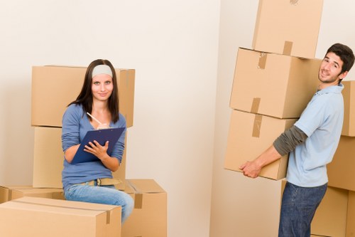 Professional removals team handling office relocation items