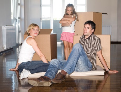 Furniture being moved through a Whitechapel apartment building